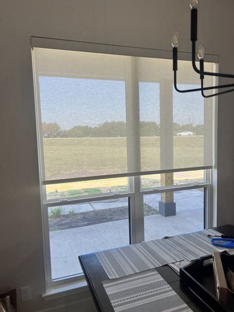 Solar shade on a large picture window