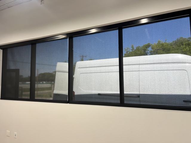 Dark shades on a long window band