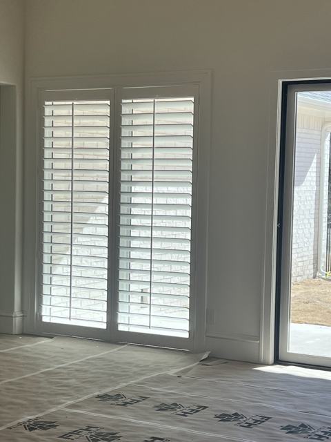 Plantation shutters on patio doors
