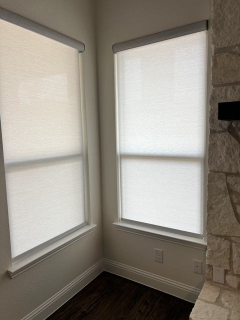 Light-filtering shades in a corner